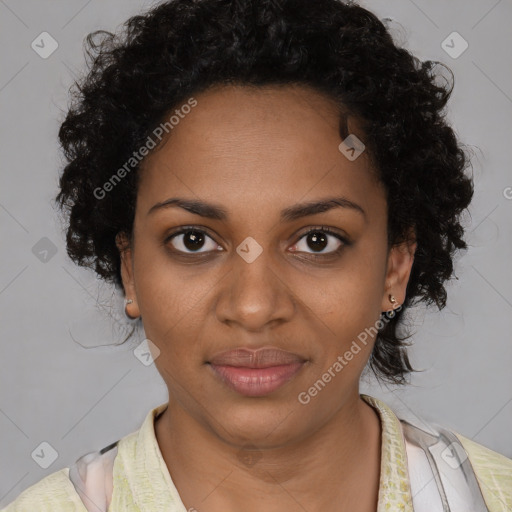 Joyful black young-adult female with short  brown hair and brown eyes