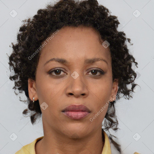 Neutral black young-adult female with short  brown hair and brown eyes