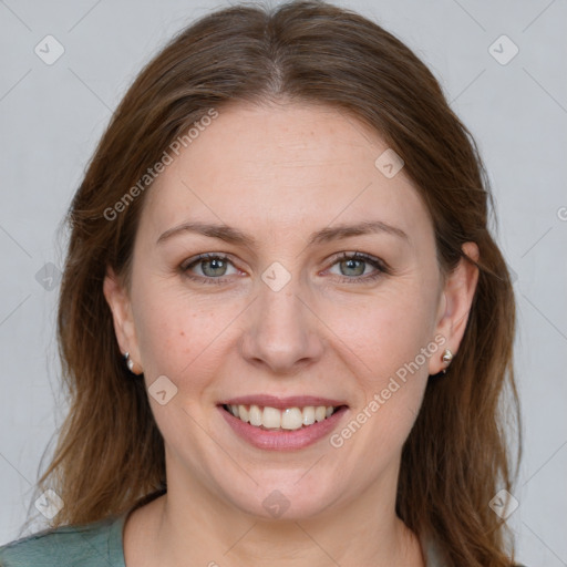 Joyful white young-adult female with long  brown hair and grey eyes