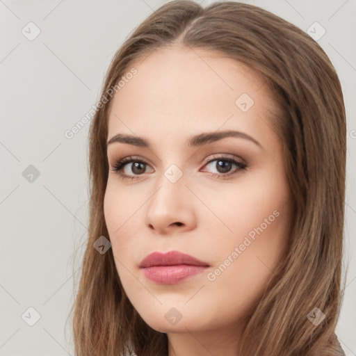 Neutral white young-adult female with long  brown hair and brown eyes