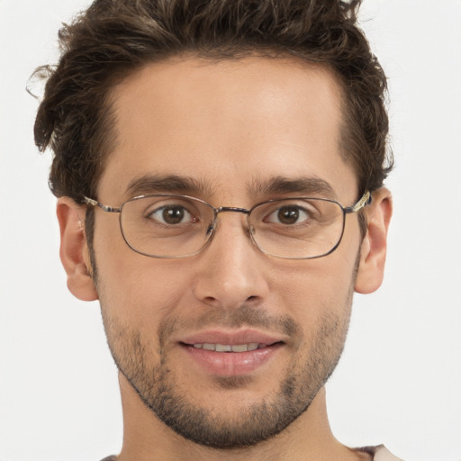 Joyful white adult male with short  brown hair and grey eyes