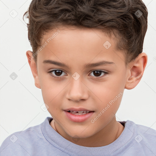 Joyful white child male with short  brown hair and brown eyes