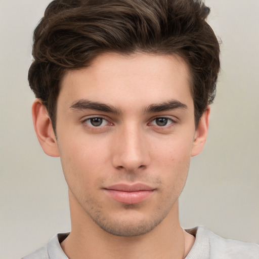 Neutral white young-adult male with short  brown hair and brown eyes