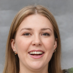 Joyful white young-adult female with medium  brown hair and grey eyes