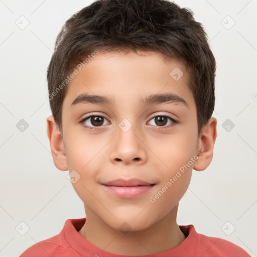 Joyful white child male with short  brown hair and brown eyes