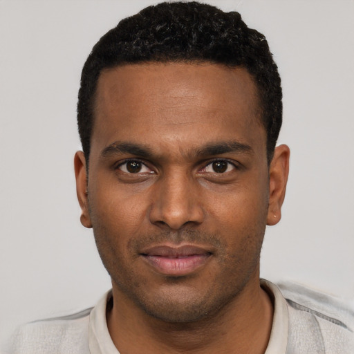 Neutral black young-adult male with short  black hair and brown eyes