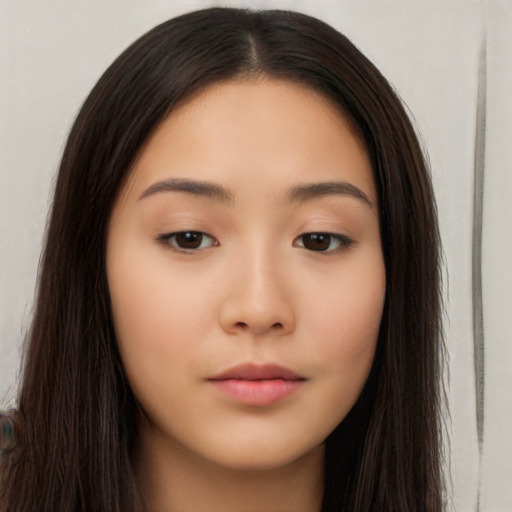 Neutral asian young-adult female with long  brown hair and brown eyes