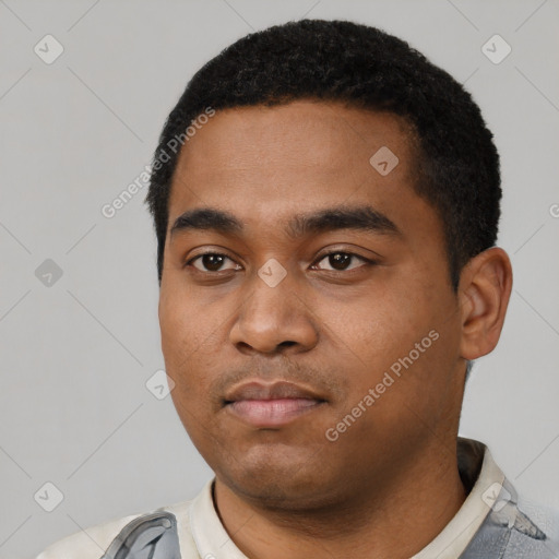 Neutral latino young-adult male with short  black hair and brown eyes