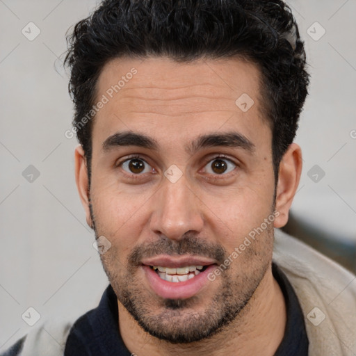 Joyful white young-adult male with short  black hair and brown eyes