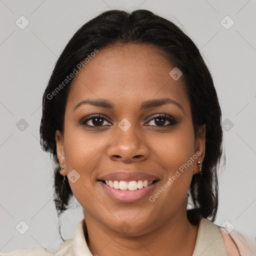 Joyful black young-adult female with medium  brown hair and brown eyes