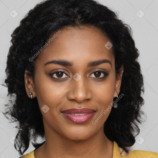 Joyful black young-adult female with medium  black hair and brown eyes