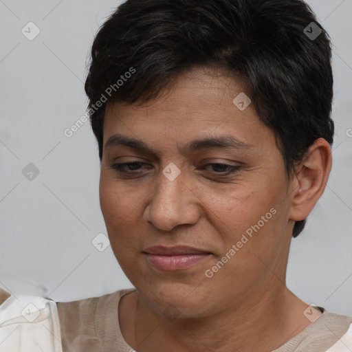 Joyful white adult female with short  brown hair and brown eyes