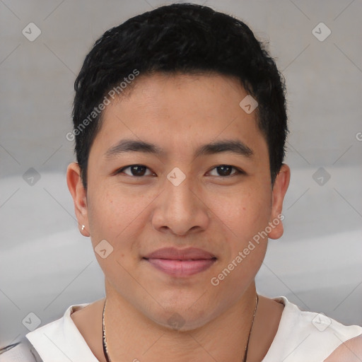 Joyful asian young-adult male with short  brown hair and brown eyes