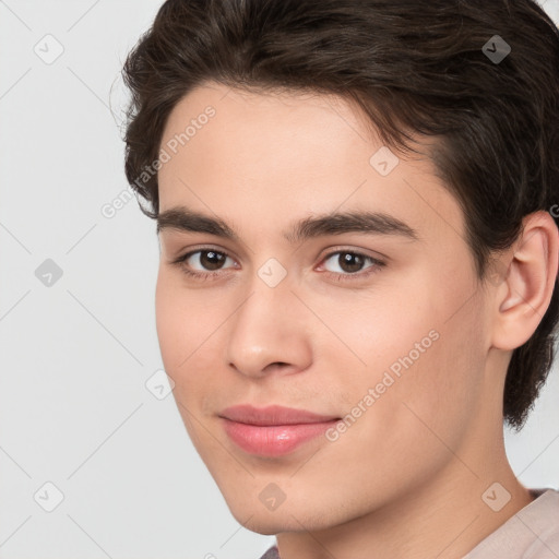 Joyful white young-adult male with medium  brown hair and brown eyes