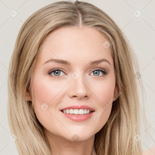 Joyful white young-adult female with long  brown hair and blue eyes