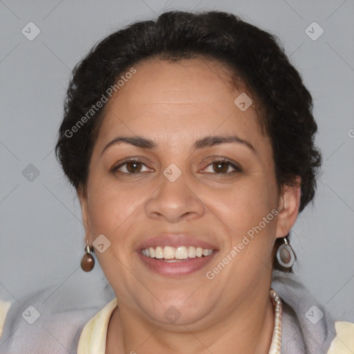 Joyful latino adult female with short  brown hair and brown eyes