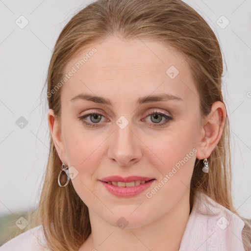 Joyful white young-adult female with medium  brown hair and blue eyes