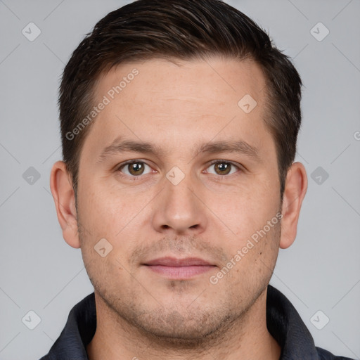 Joyful white adult male with short  brown hair and brown eyes