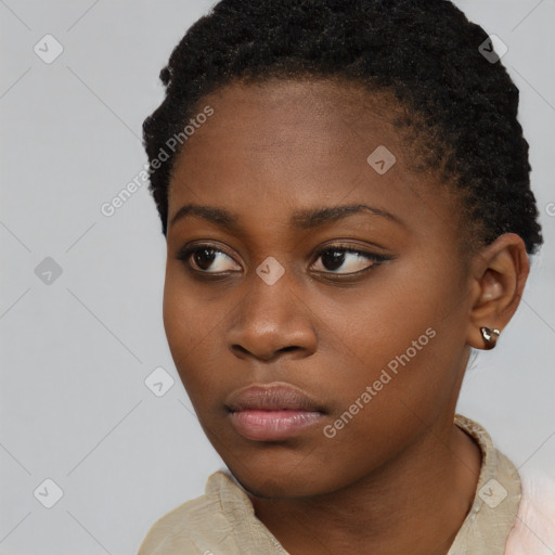 Neutral black young-adult female with short  brown hair and brown eyes