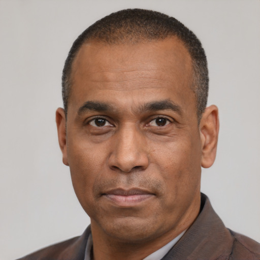 Neutral latino adult male with short  black hair and brown eyes
