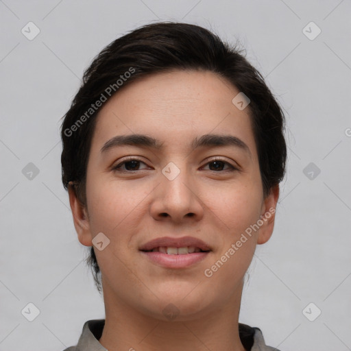 Joyful white young-adult female with short  brown hair and brown eyes