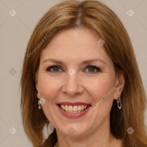 Joyful white adult female with medium  brown hair and brown eyes