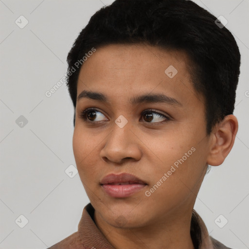 Joyful latino young-adult female with short  black hair and brown eyes