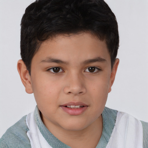 Joyful white child male with short  brown hair and brown eyes