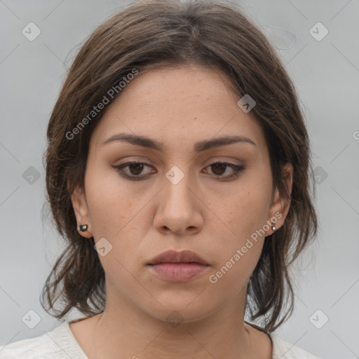 Neutral white young-adult female with medium  brown hair and brown eyes