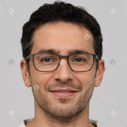 Joyful white adult male with short  brown hair and brown eyes