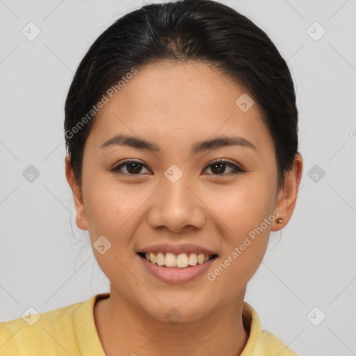 Joyful asian young-adult female with short  brown hair and brown eyes