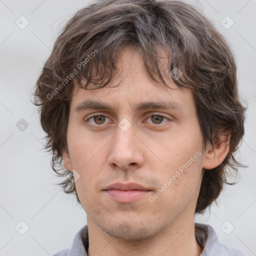 Neutral white young-adult male with medium  brown hair and brown eyes