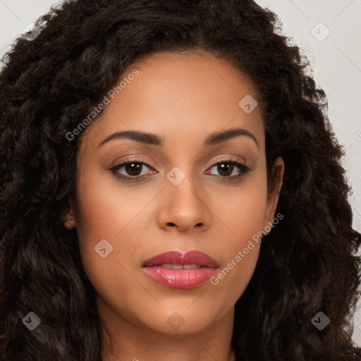 Joyful latino young-adult female with long  brown hair and brown eyes