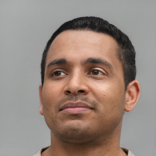 Neutral white young-adult male with short  black hair and brown eyes