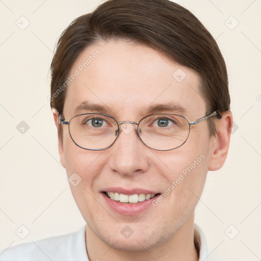 Joyful white adult male with short  brown hair and grey eyes