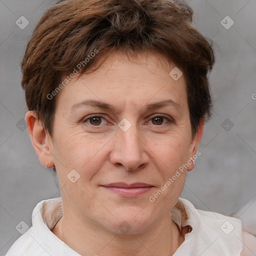 Joyful white adult female with short  brown hair and brown eyes