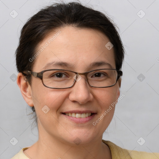 Joyful white adult female with short  brown hair and brown eyes