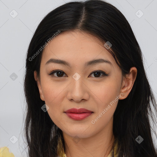 Joyful asian young-adult female with long  brown hair and brown eyes