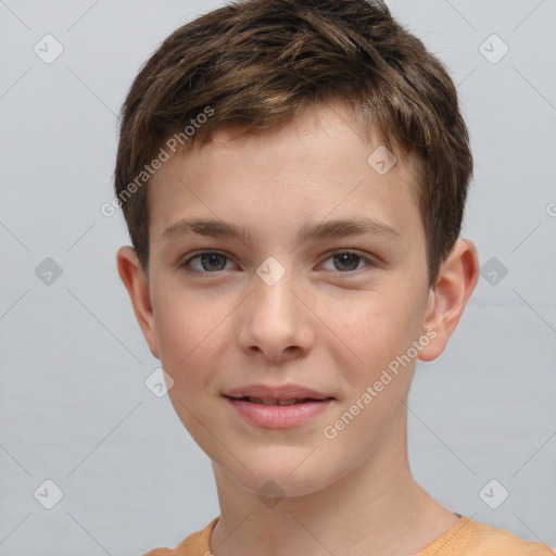 Joyful white child male with short  brown hair and brown eyes