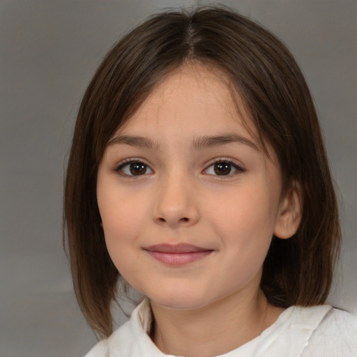 Joyful white child female with medium  brown hair and brown eyes