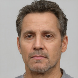 Neutral white adult male with short  brown hair and brown eyes