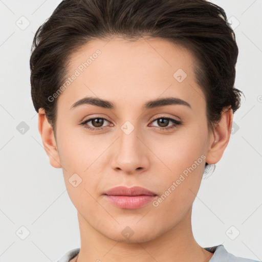 Joyful white young-adult female with short  brown hair and brown eyes