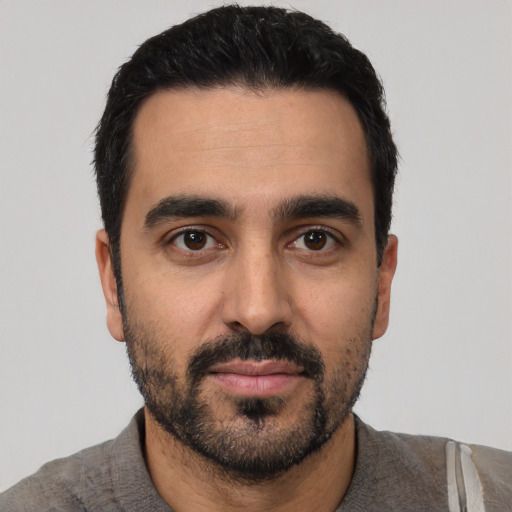 Neutral white young-adult male with short  black hair and brown eyes