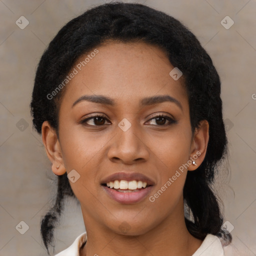 Joyful black young-adult female with medium  black hair and brown eyes