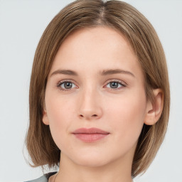 Neutral white young-adult female with medium  brown hair and grey eyes