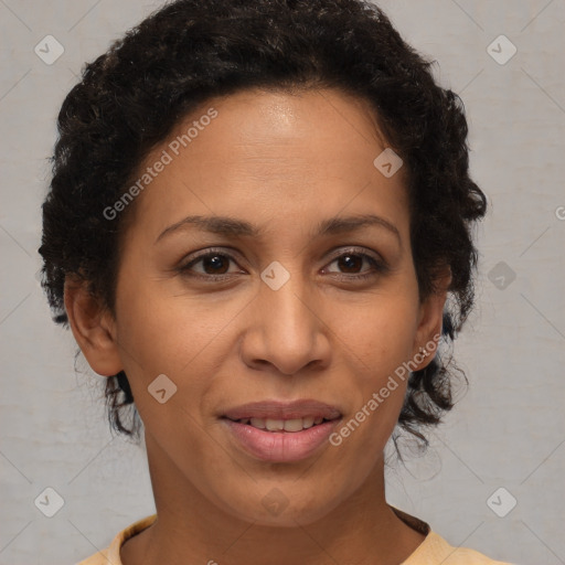 Joyful latino adult female with short  brown hair and brown eyes