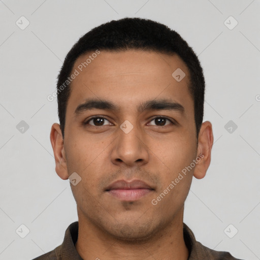 Neutral latino young-adult male with short  black hair and brown eyes