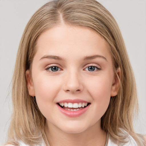 Joyful white young-adult female with medium  brown hair and blue eyes