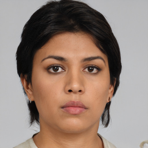 Neutral asian young-adult female with medium  black hair and brown eyes