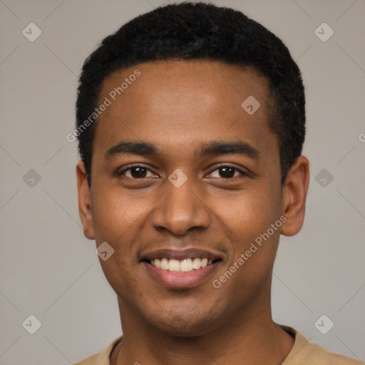 Joyful black young-adult male with short  black hair and brown eyes